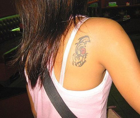 Женские татуировки (33 Фото)