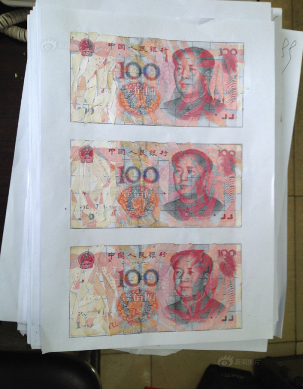 Семейная пара из Китая в течение трех месяцев склеивала измельченные купюры на сумму в 21 000 долларов  (3 фото)