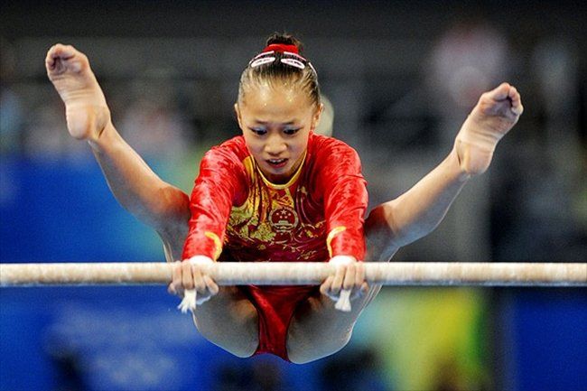Соревнования по спортивной гимнастике на Олимпиаде (12 Фото)