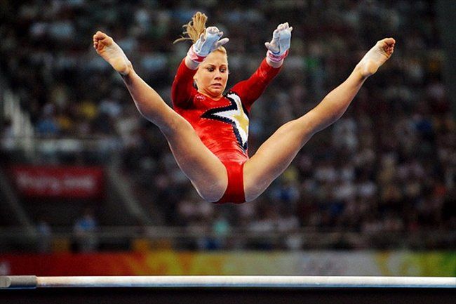 Соревнования по спортивной гимнастике на Олимпиаде (12 Фото)